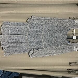 This dress is sheer long sleeve. Knee length . Brand of Hayden 1xl